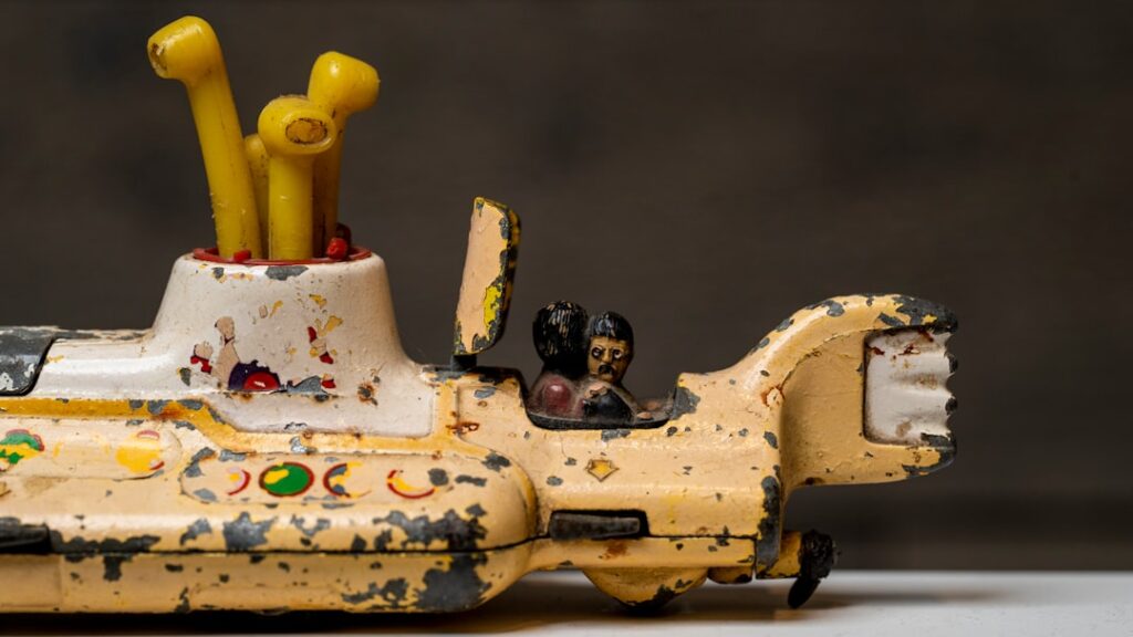 Asbestos Found in Children's Toys: Health Risks a yellow toy car with yellow sticks sticking out of it