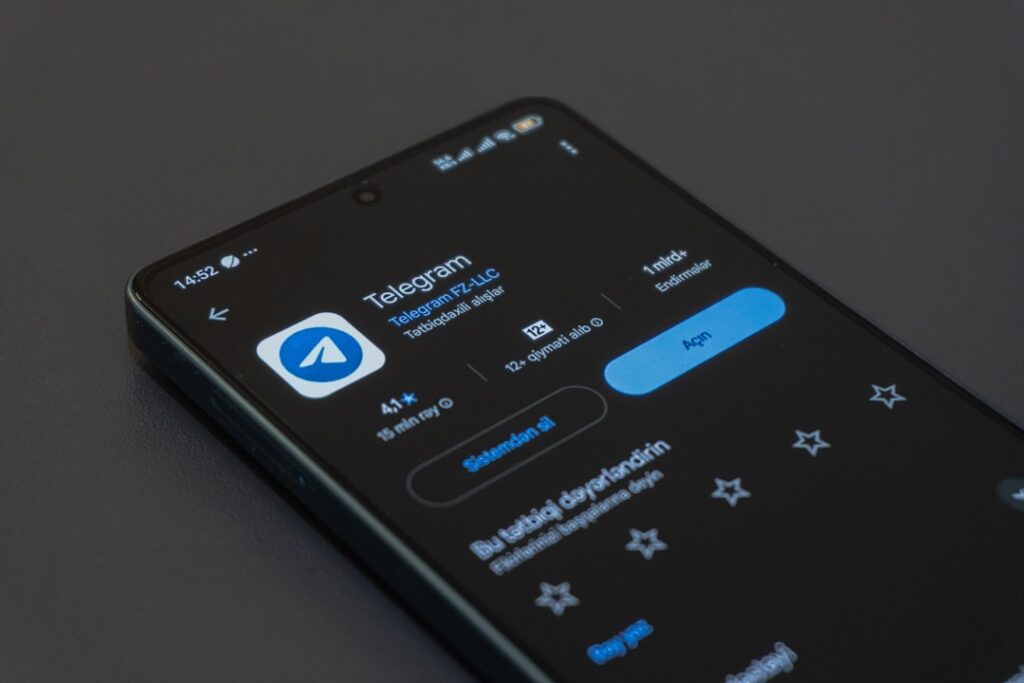 The Algorithm Wars: When Culture Becomes Manufactured A phone screen displays the telegram app.