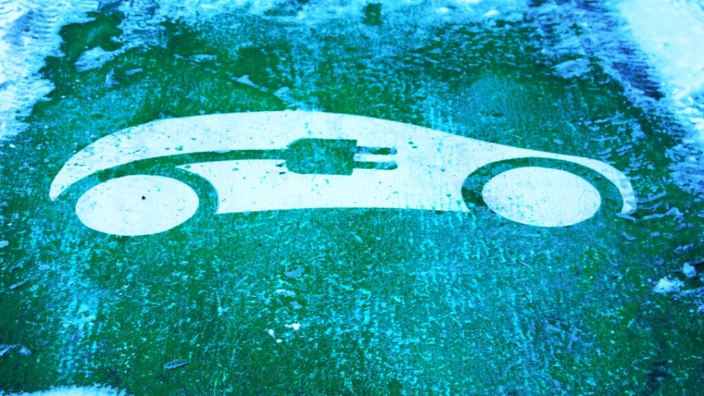 Tax Season Updates: New Deductions for EV and Online Sellers Electric car charging symbol on green ground