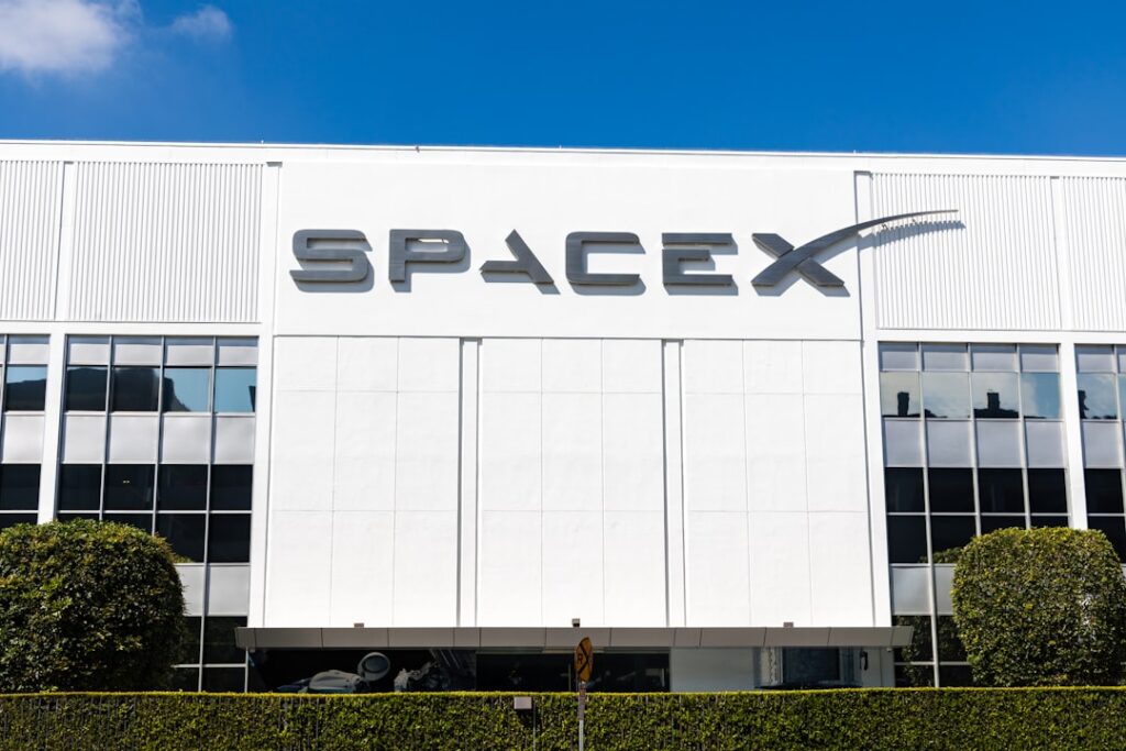 BingX Launches SpaceX Pre-IPO Futures Trading a building with a sign that says spacex on it