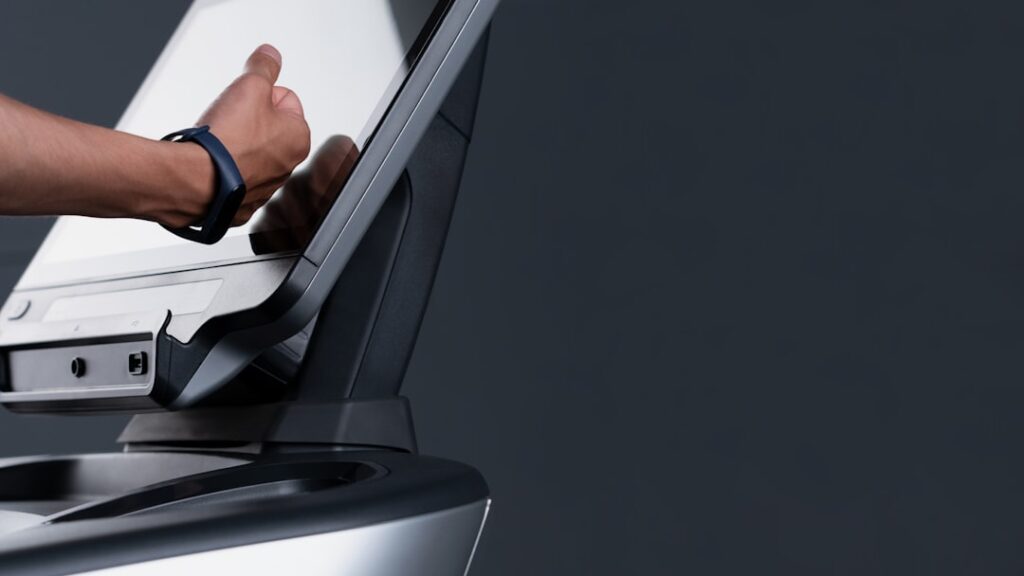 iScanner App: Replace Your Bulky Scanner for $26 a person using a laptop computer on a desk