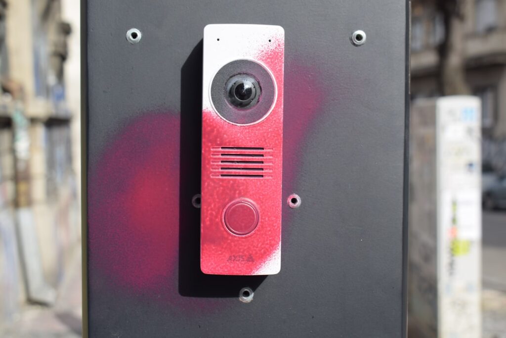 Akuvox X910 Wins Red Dot Award for AI-Powered Smart Intercom Intercom device with red spray paint markings