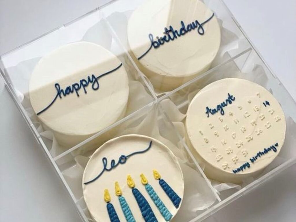 USPS Birthday Forever Stamp Celebrates Special Occasions a group of white balls with writing on them