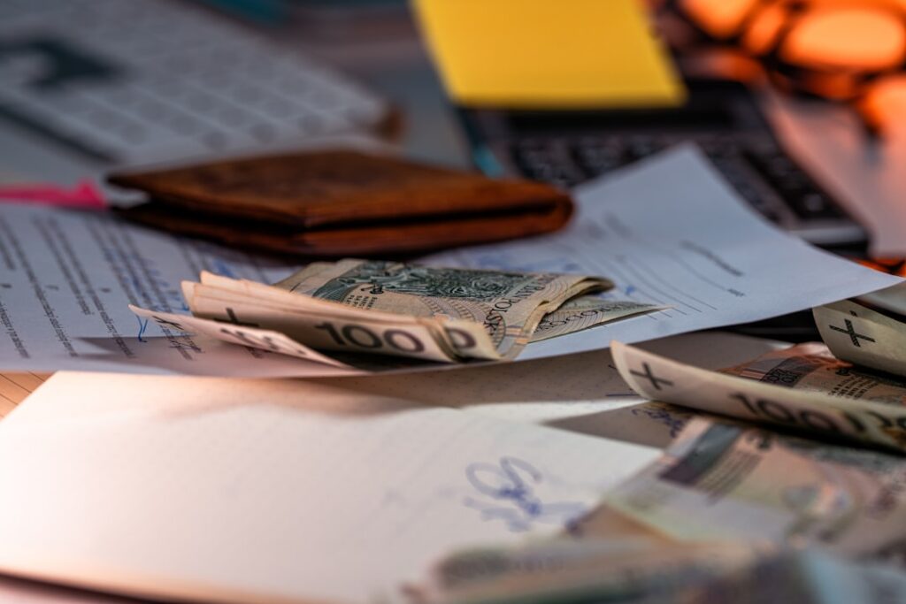 AP vs AR: Understanding Business Cash Flow Essentials Money and documents on a desk.