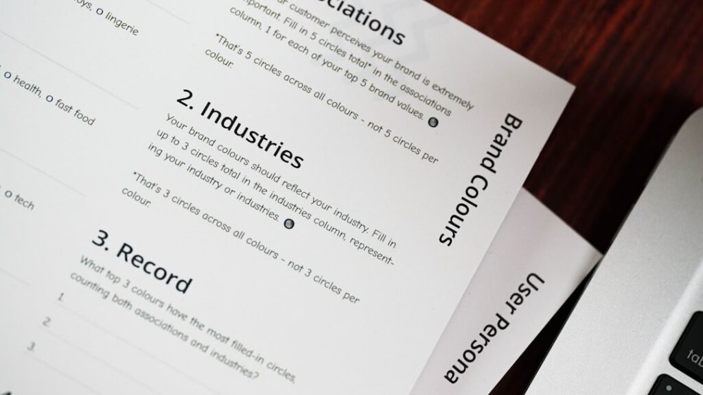 FDD Franchise Disclosure Documents Explained a computer keyboard sitting on top of a wooden table