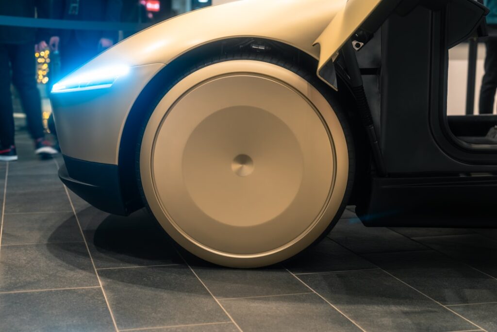 Tesla Expands Robotaxi Service to Dallas and Houston A close up of a robot on a tiled floor