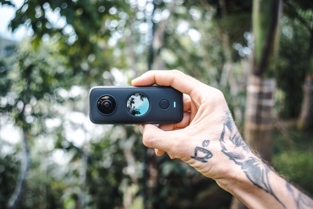 Insta360 Luna Series Launch at NAB 2026 person holding black iphone 4