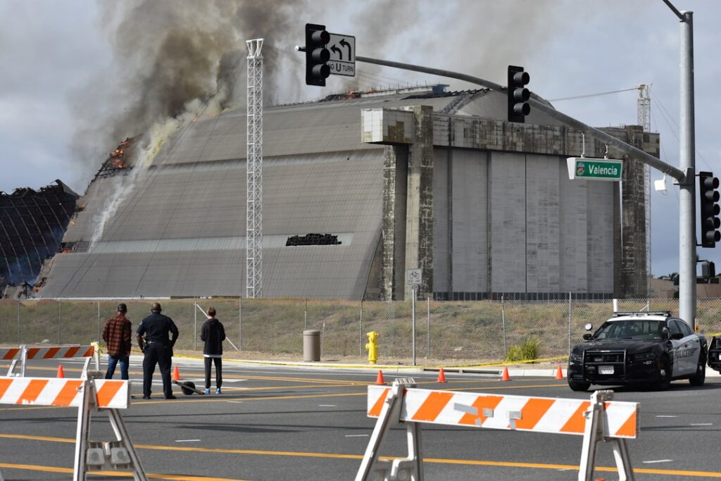 Vehicle Fire Risk: Major Recall Alert for Car Owners Building on fire with emergency responders present