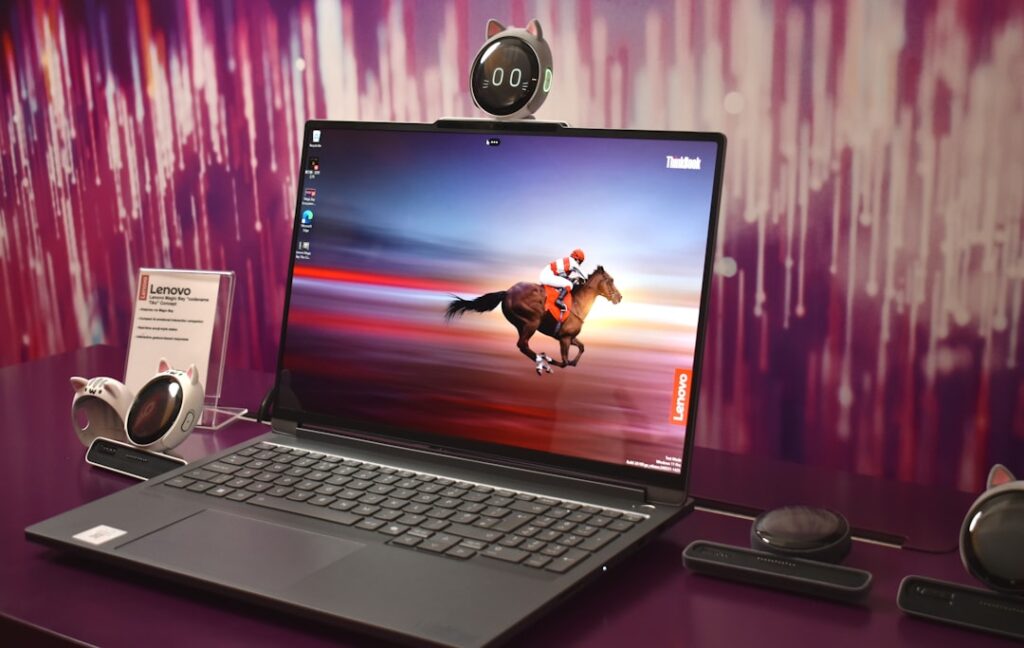 Budget Lenovo ThinkPad Laptop Deal Saves $1,000 Laptop displaying a horse racing on its screen.
