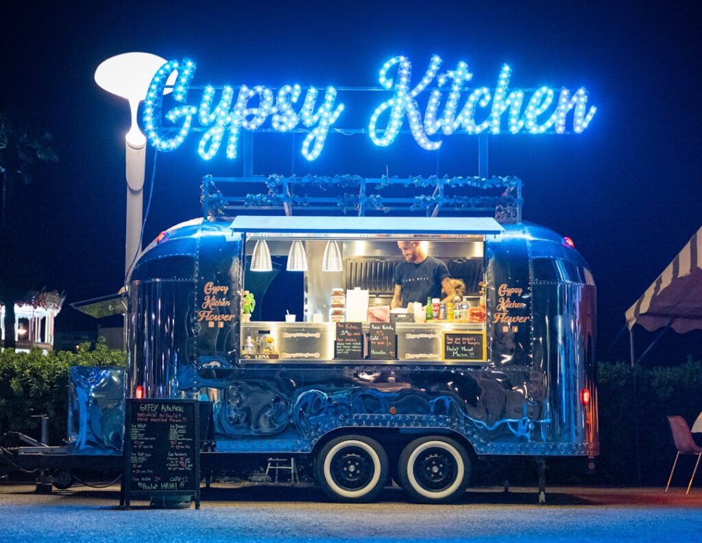 Goop Kitchen's NYC Expansion: Ghost Kitchens Reshape Dining a food truck parked in front of a restaurant