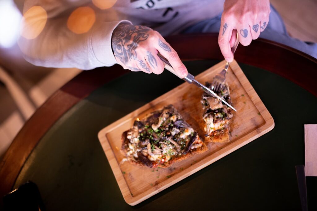 Burger King Launches Star Wars Menu May 4th Nationwide a person cutting a pizza