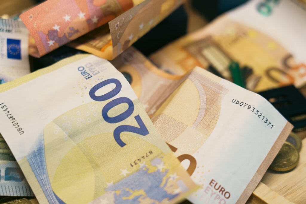 Personal Credit's Hidden Impact on Business Loan Success There is a pile of euro banknotes.