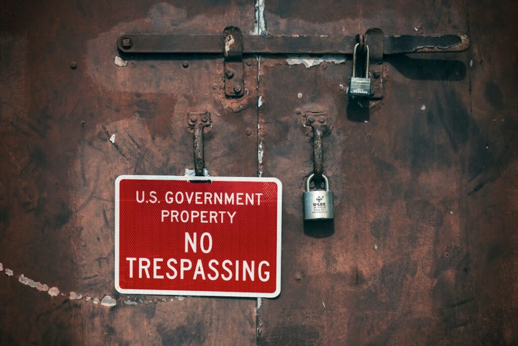 France's ID Agency Hit by Major Data Breach a no trespassing sign on a rusty door