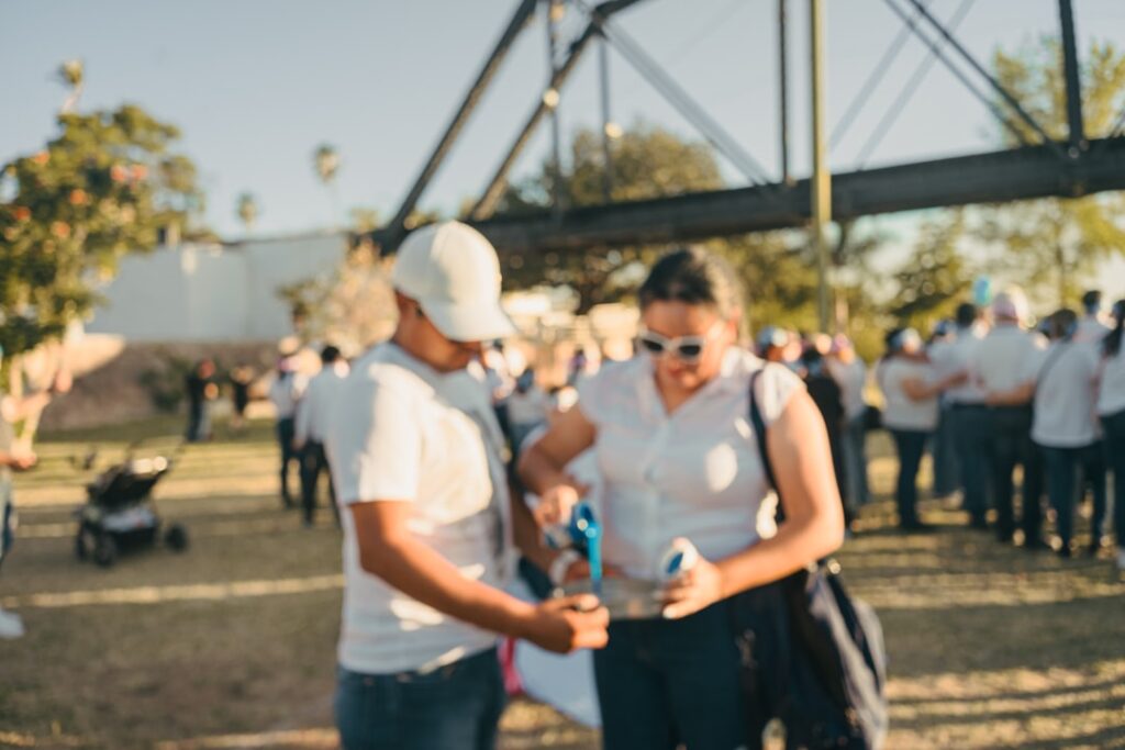 IUPAT District Council 21 Community Day of Action 2026 Two people interact at an outdoor gathering