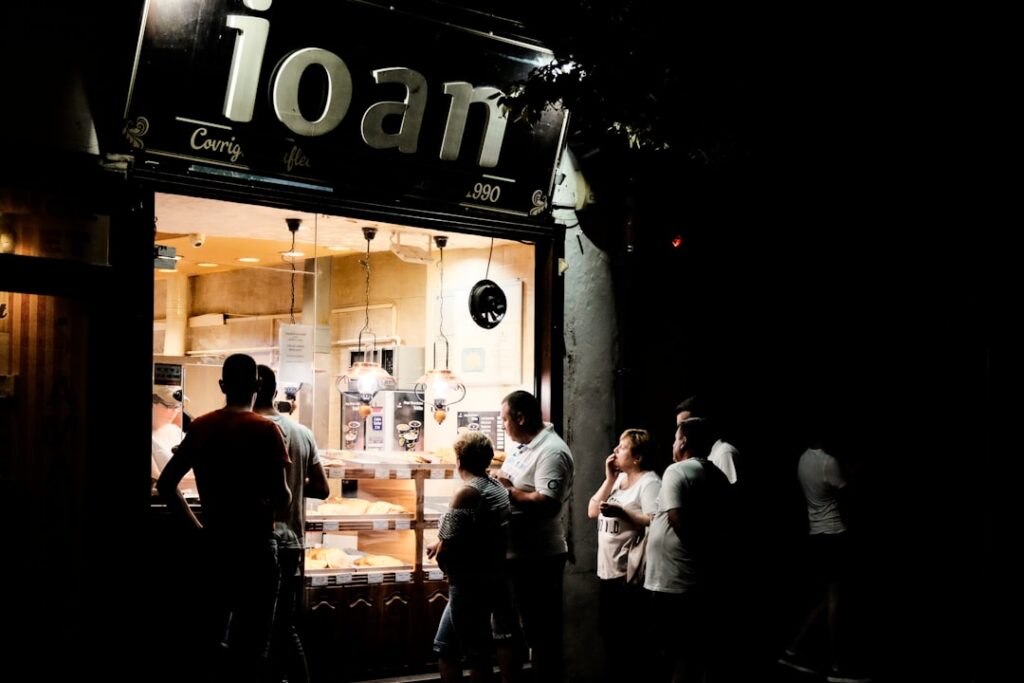 SBA BOLT Loans: Fast Capital for Growing Businesses people standing outside the shop during nighttime