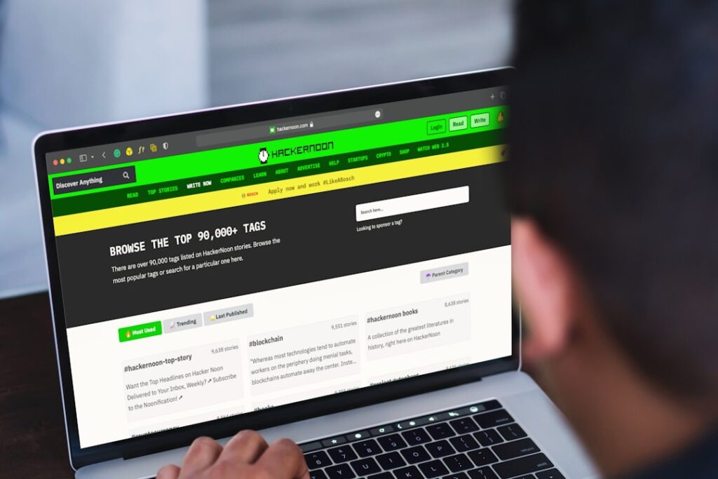 Digital Benefits Management: The Complete Business Guide A man sitting in front of a laptop computer