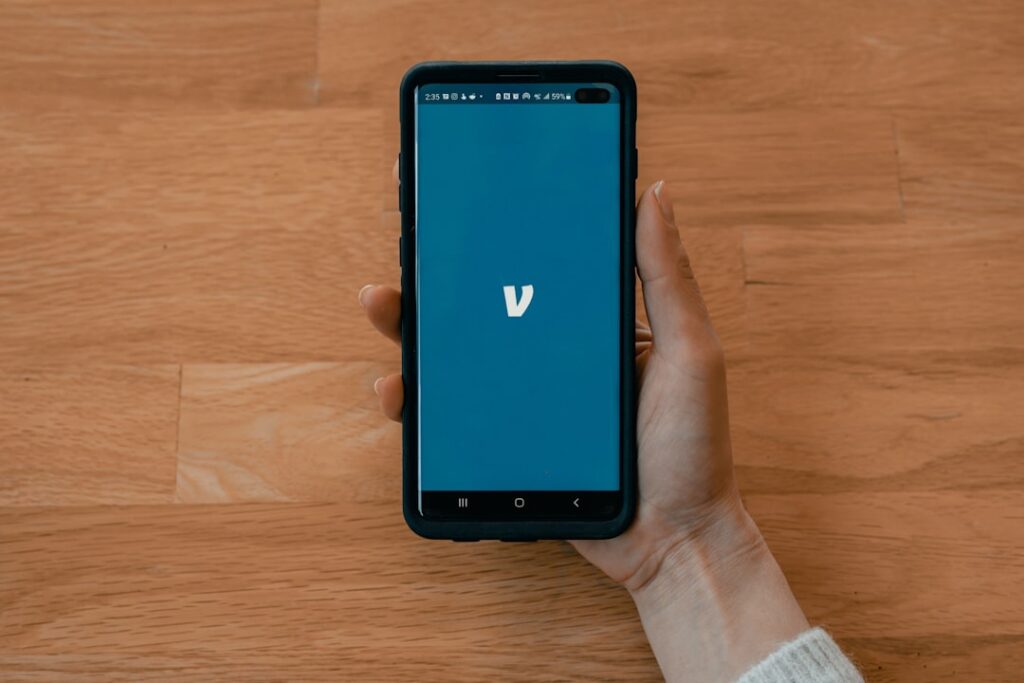 Venmo's Cash Back Expansion: What Small Businesses Need to Know black samsung android smartphone displaying blue screen