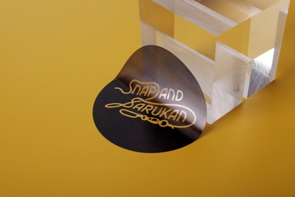 Personalized Shopping: Transform Your Retail Experience Today A black sticker with gold text sits near object.