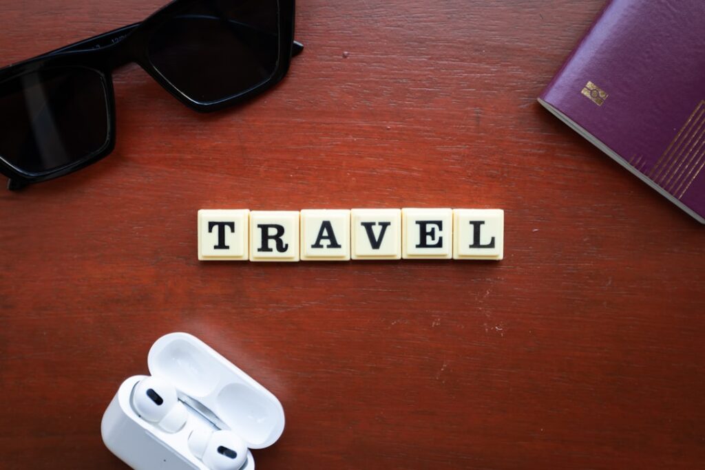 Is Travel Insurance Worth the Investment? the word travel spelled with scrabbles on a wooden table