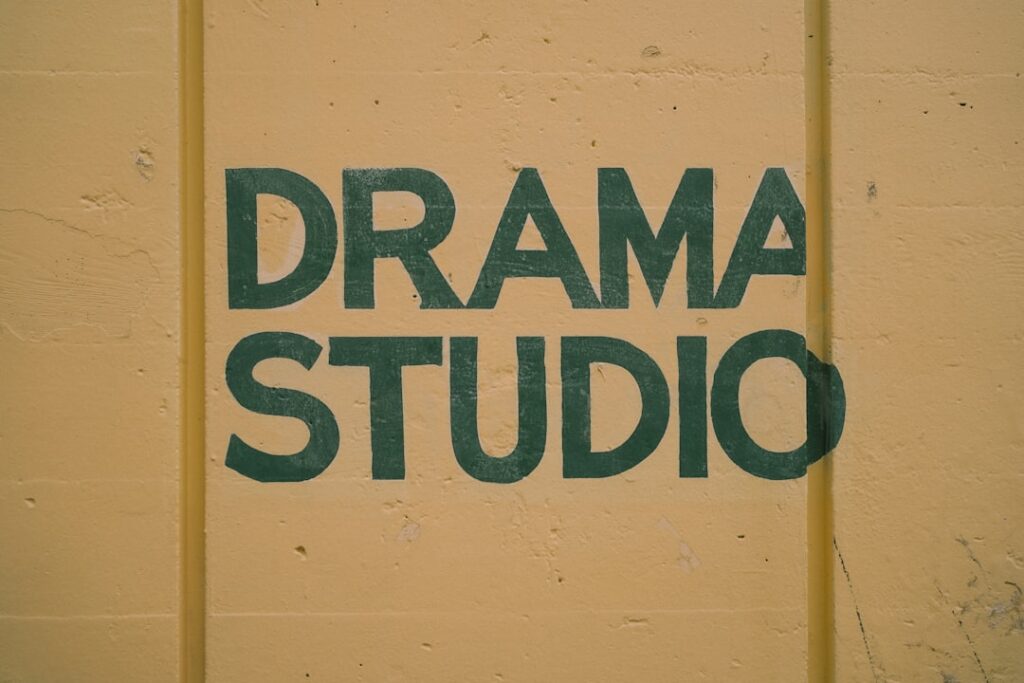Trade Desk Partners DramaBox to Expand Open Internet Ads a sign that says drama studio painted on a wall