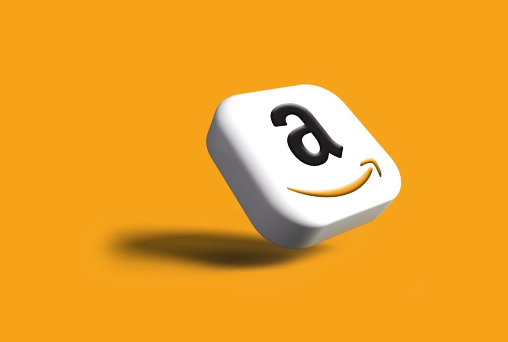 Amazon's Aggressive Pivot: The Podcast Monetization Gambit a close up of a dice with an amazon logo on it