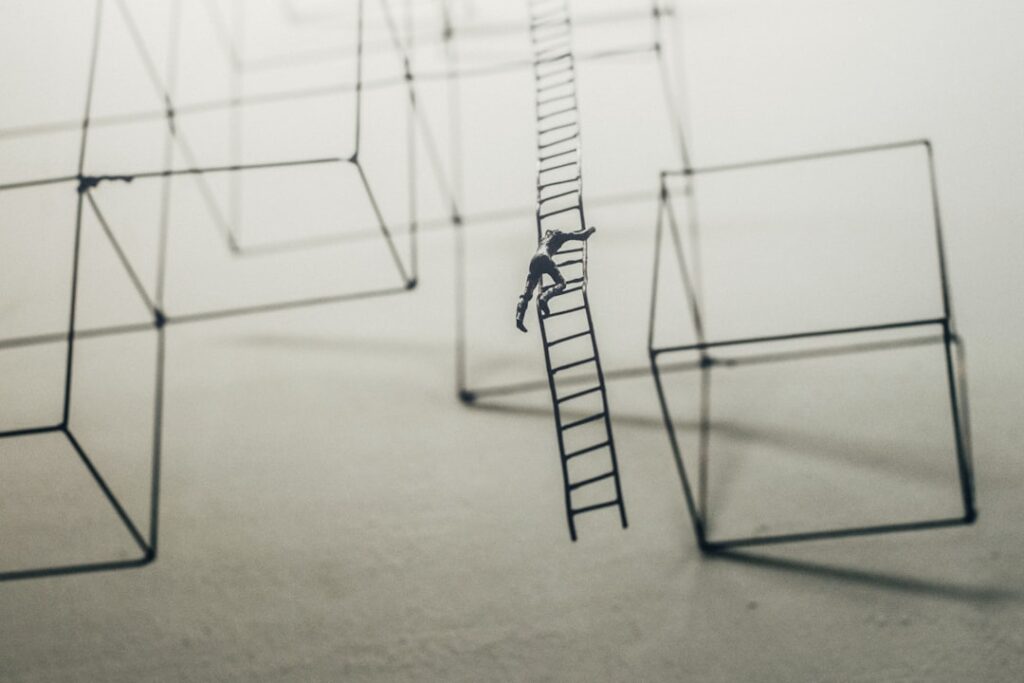 Career Growth Stages: Evolve Beyond the Plateau man in stairs