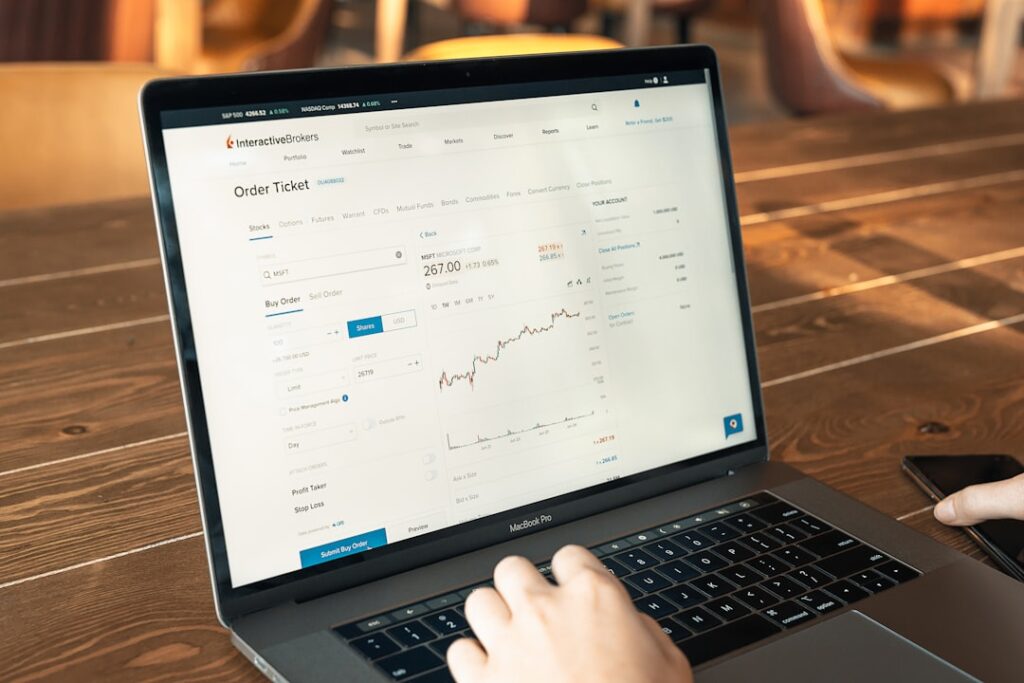 Cash Flow Mastery: Why Revenue Growth Alone Fails person using macbook pro on brown wooden table