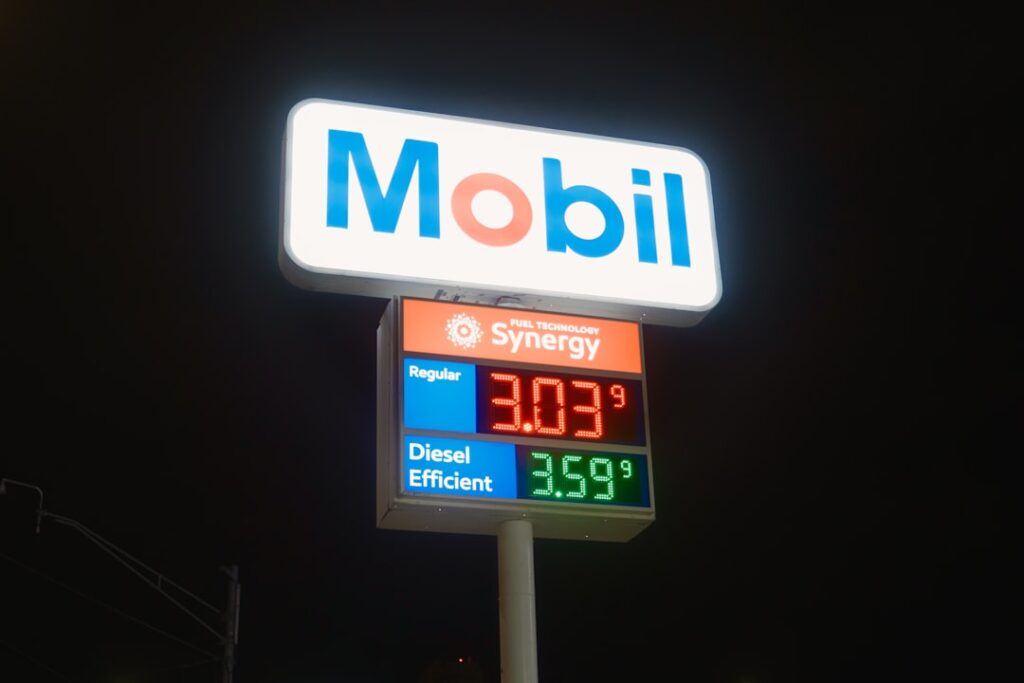 Diesel Prices Surge 46%: Fleet Recovery Strategies Revealed Mobil gas station sign with fuel prices at night