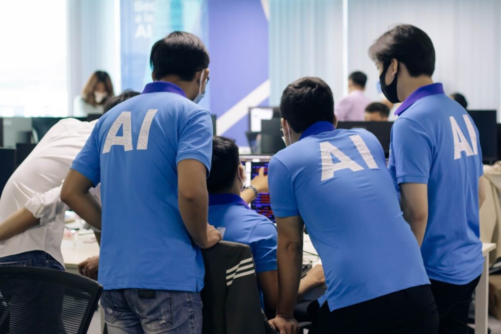 Five Human Skills That Give You Edge Over AI man in blue nike crew neck t-shirt standing beside man in blue crew neck t