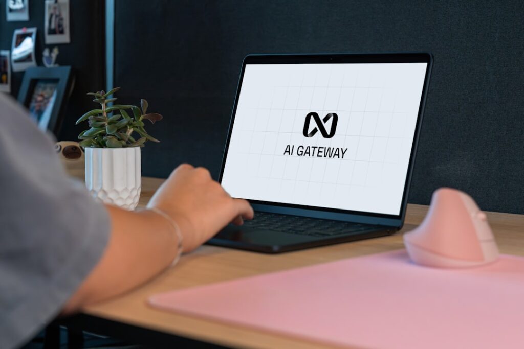 Google Workspace AI: Your Digital Office Assistant Arrives Person typing on laptop with "ai gateway" logo.