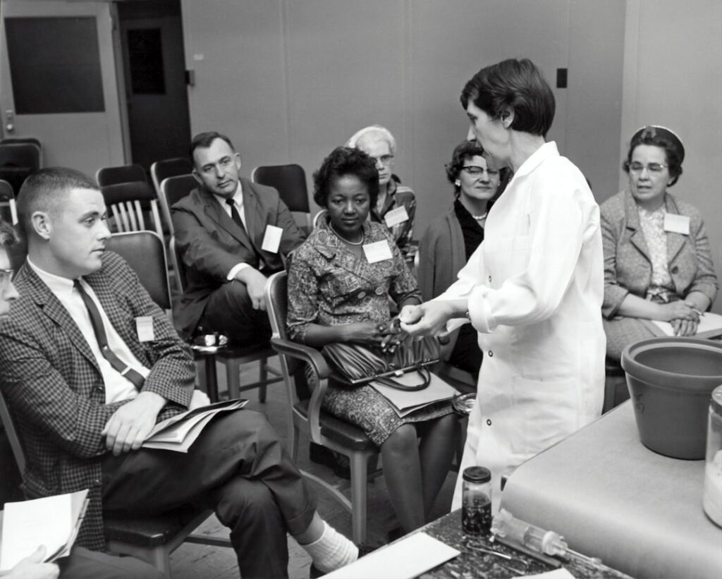 Jazz Pharma Unveils Ziihera Data at ASCO 2026 grayscale photo of people inside room