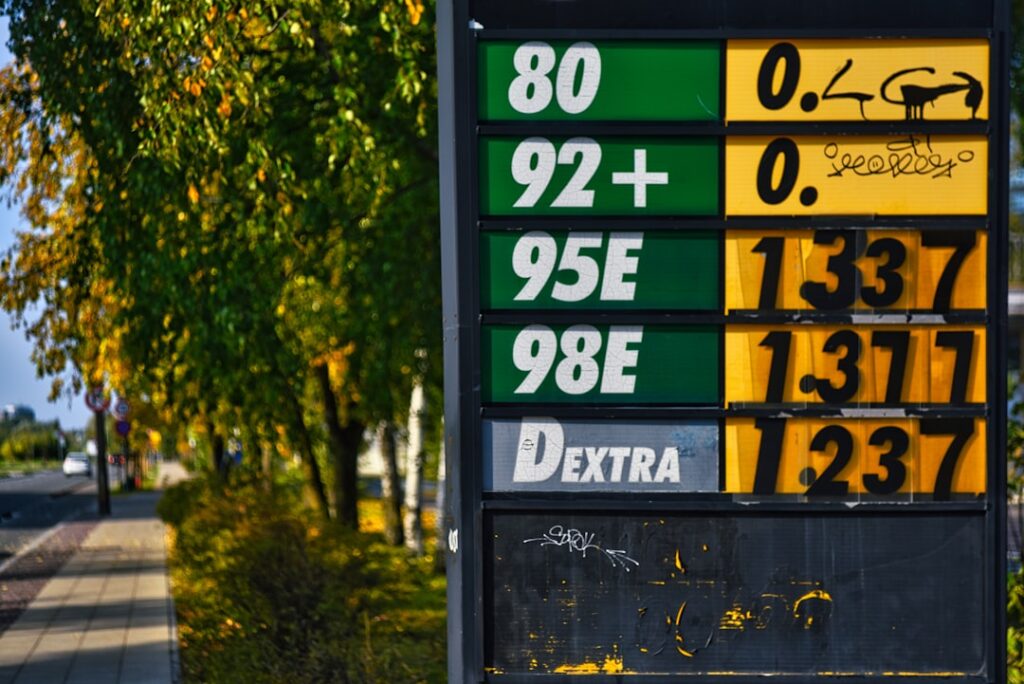 Jersey Inflation Holds at 2.7% Amid Energy Price Surge Gas prices displayed on a sign at a station.