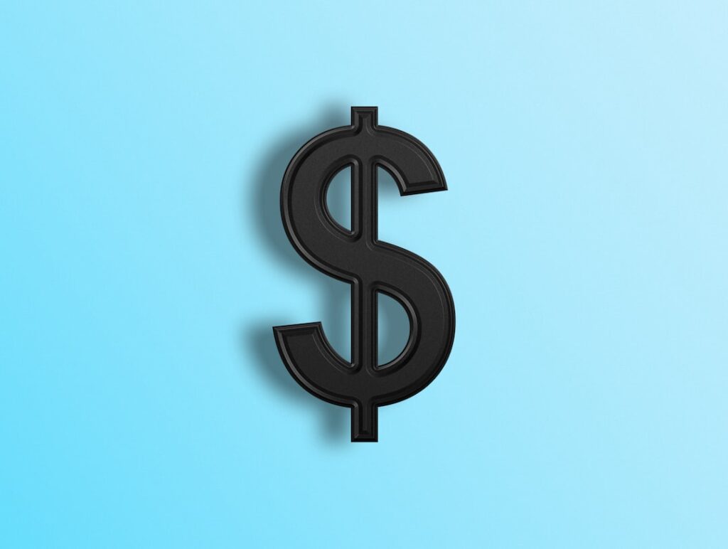 Kansas City Life Declares $0.18 Quarterly Dividend a black dollar sign on a blue background