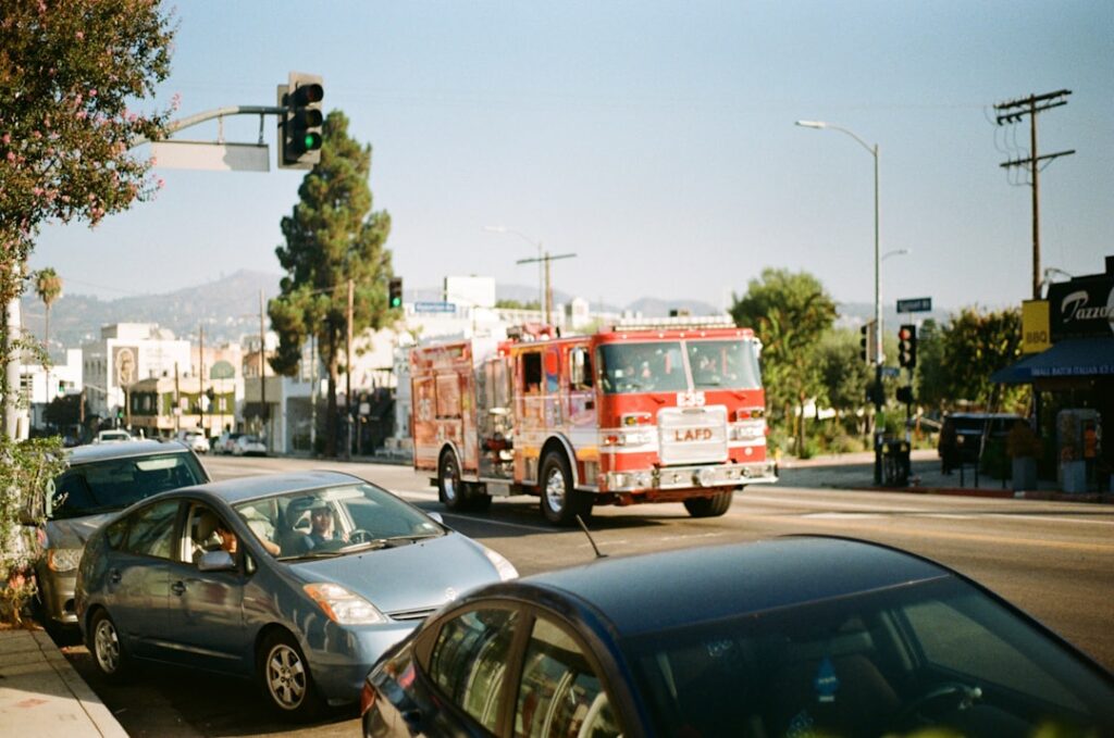 LG's Hybrid eCall Solution Reshapes Emergency Vehicle Safety Fire truck driving down a city street.