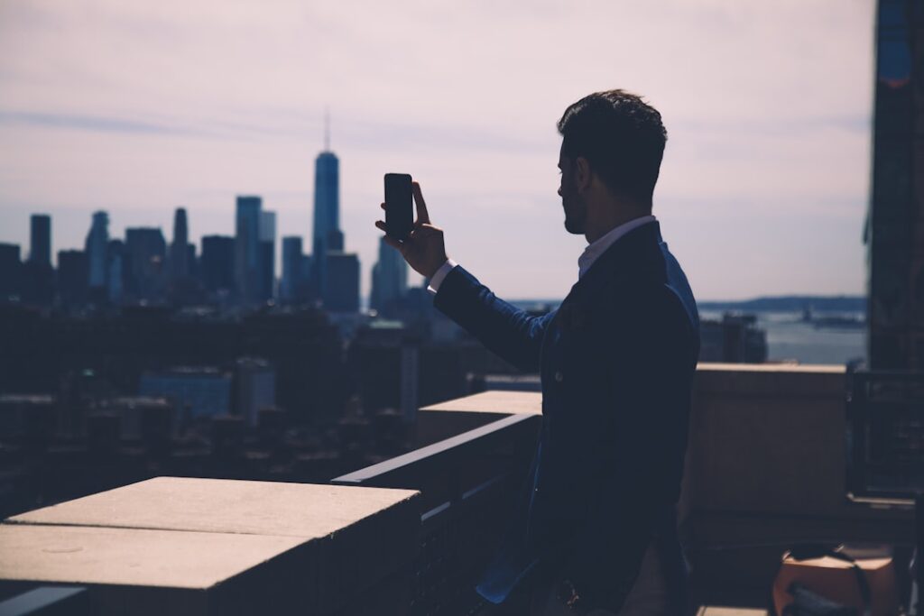 NYC Mayor's Bold Pied-Ã -Terre Tax Video Goes Viral a man taking a picture of a city