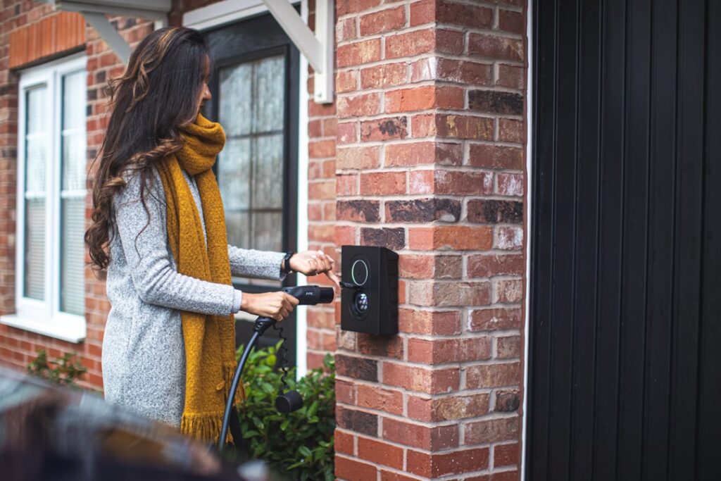 PG&E PowerHouse: Electrification Made Accessible a woman is opening the door of her house