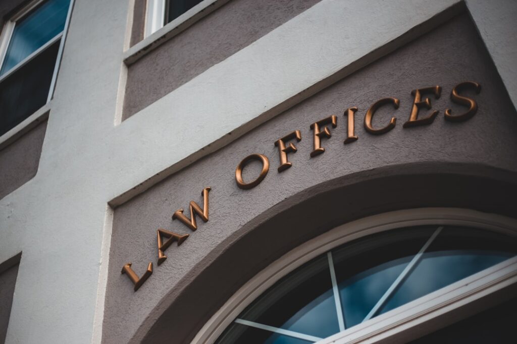 PM Law Ltd Collapse Triggers £39.5M Fraud Investigation a law office sign on the side of a building