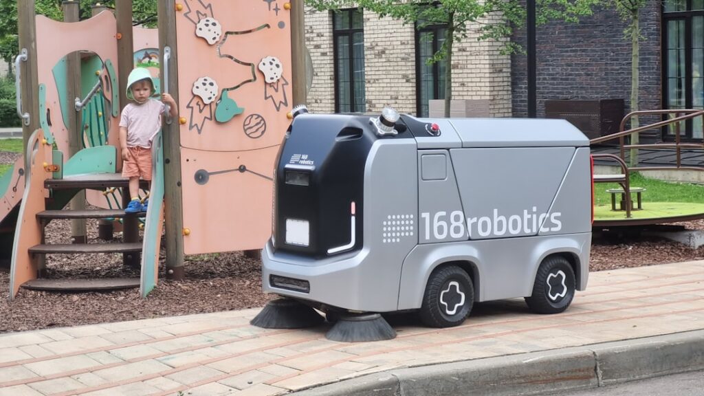 Pudu Robotics Launches AI Robot Partnership in Europe a child's play area with a play structure and a slide