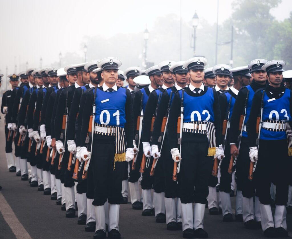 S Corporation Formation: Complete Guide to Tax Benefits A large group of men in uniform marching down a street