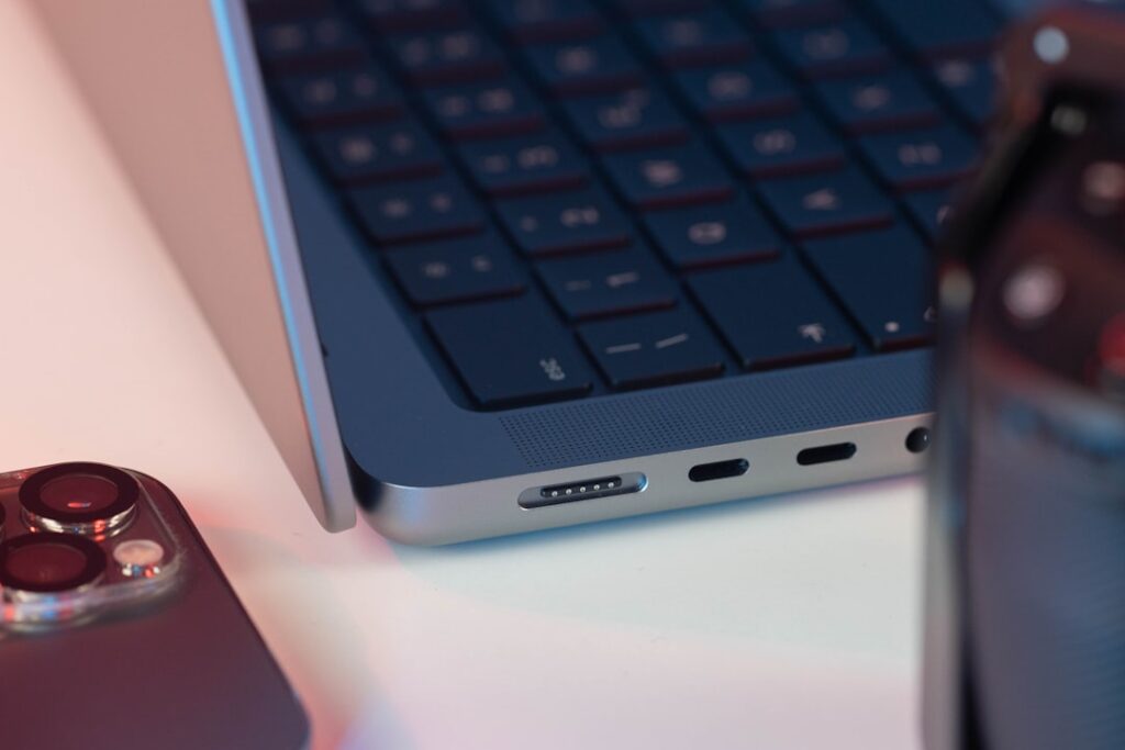 SpeakOn's $129 MagSafe Dictation Device Falls Short a close up of a cell phone near a laptop
