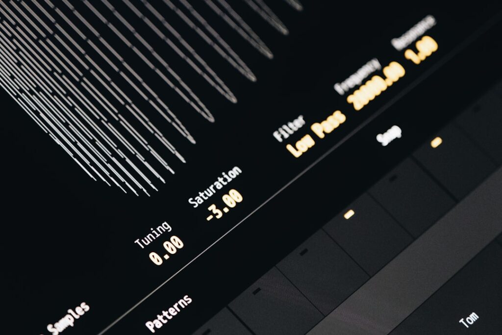 Spotify's Silent Stance on AI-Generated Music Filtering A close up of a keyboard with a blurry background