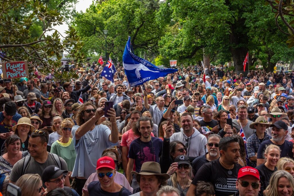 Trump's Conservative Vision: What America's Right Really Wants a large group of people standing in a park