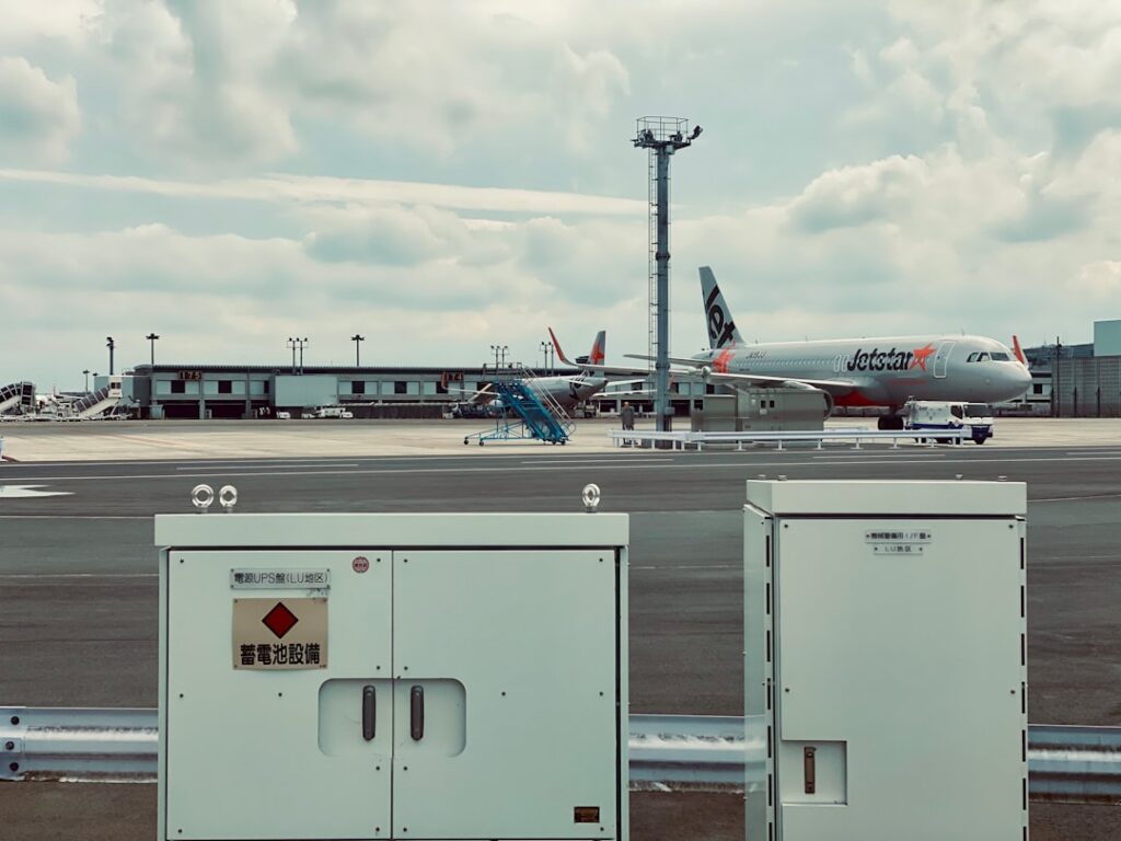 Airlines Get Green Light to Cancel Flights Over Fuel Shortages white and red airplane under white clouds during daytime