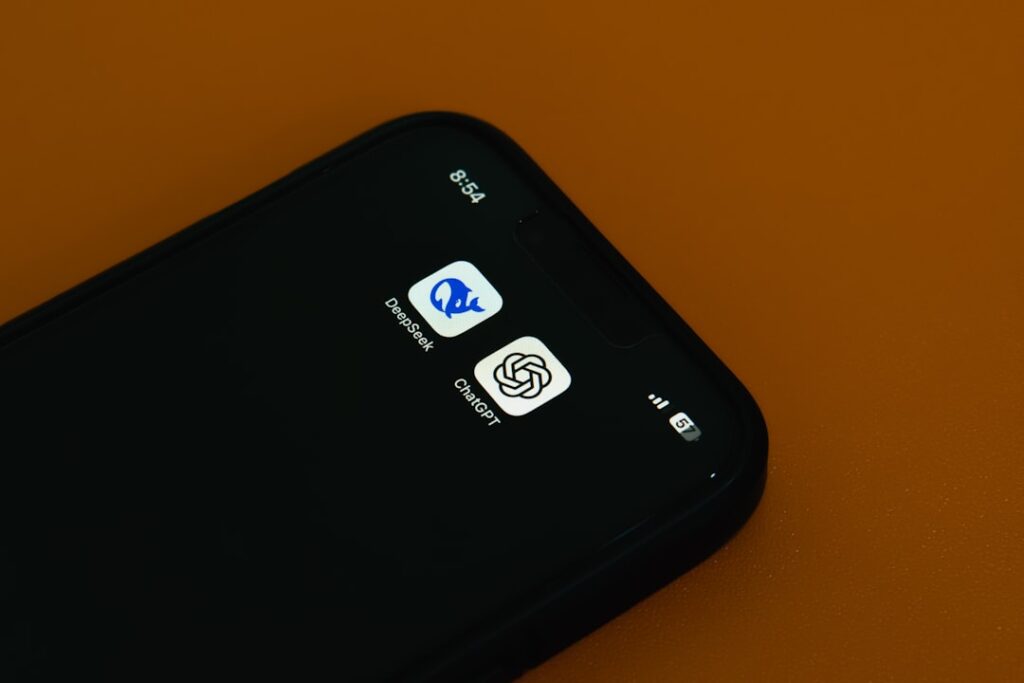 Apple iOS 27 Gives Users Choice in AI Models A close up of a cell phone on a table