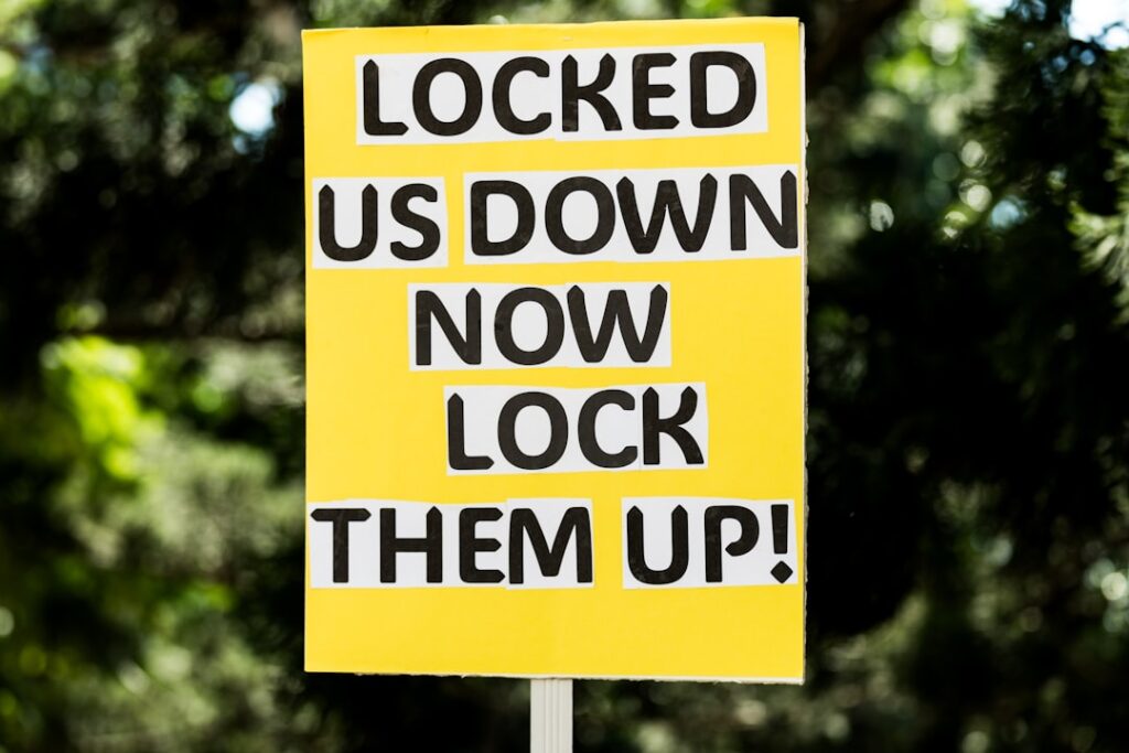 Ask.com Search Engine Shutting Down: IAC Ends Service a yellow sign that says locked us down now look them up