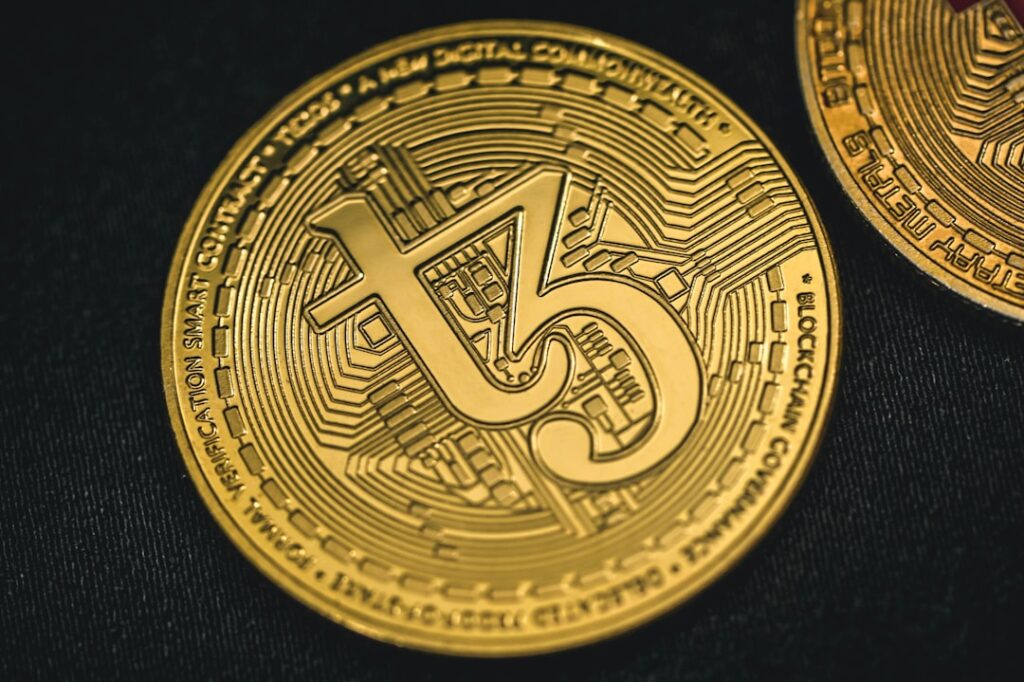 Bison Bank Launches MiCA-Compliant Stablecoin for Global Payments a close up of a gold coin with the letter s on it