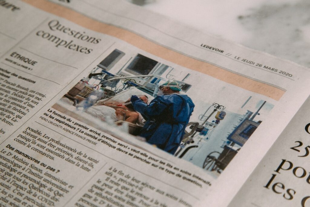 BulletinHealthcare Relaunches Daily Briefing for NY Doctors man in blue jacket and blue denim jeans