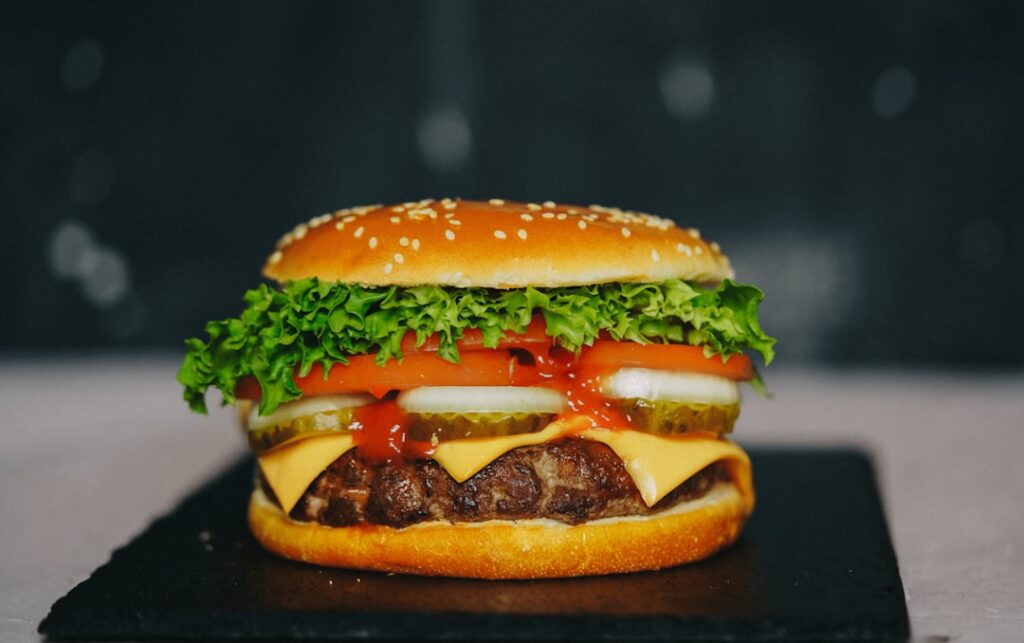 Burger King CEO's Customer Calls Drive Real Restaurant Changes burger with lettuce and tomato