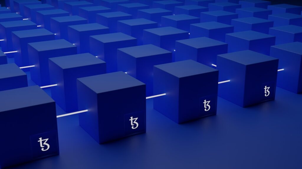 Commodity Tokenization: The Future of Tech Giants a group of blue cubes with numbers on them