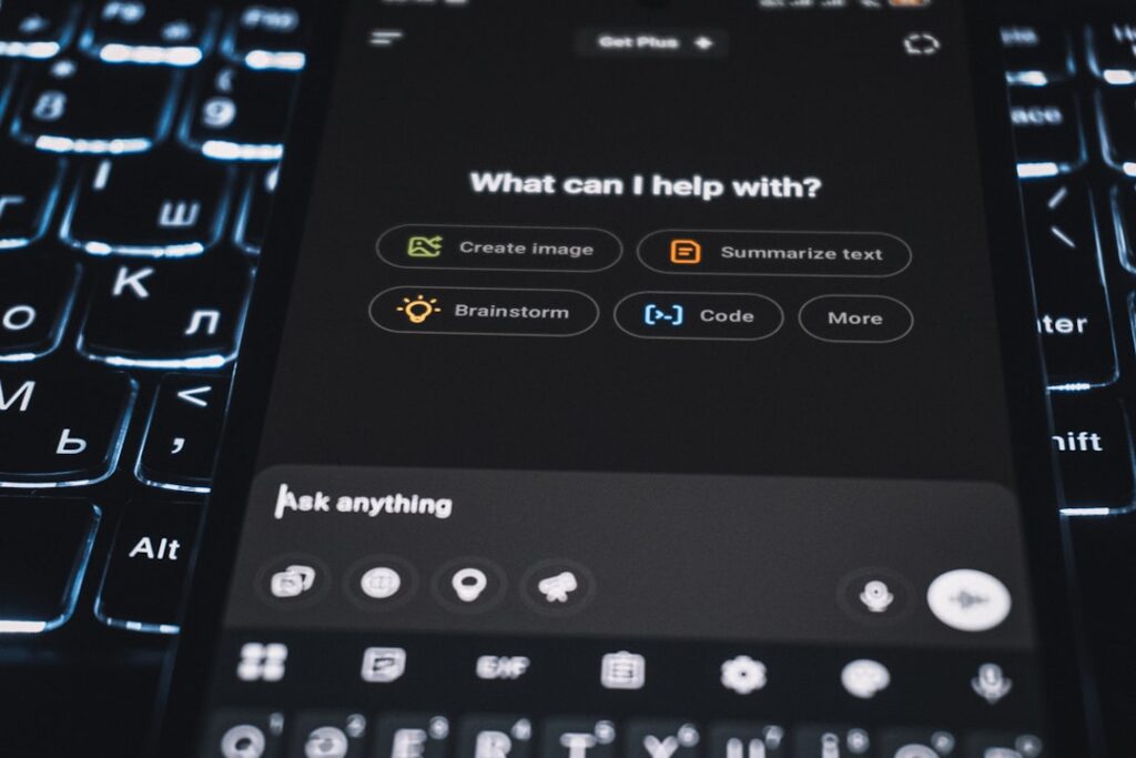 Elon Musk's Offer to OpenAI Board Member Raises Questions A smartphone is showing an ai assistant's interface.